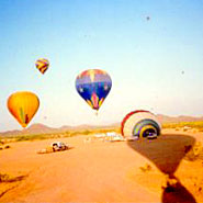 Dad way up parasailing